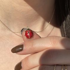 14KT yellow gold red + black enamel ladybug pendant charm. It is said that when a ladybug lands on you that is good luck- so is wearing one! Pair this ladybug charm with one of our yellow gold chains! Or add it onto a charm bracelet. Measures: 19mm x 11mm including bail Weight: .67g 3D shape Polished back side Stamped 14K Chain not included Saint Jewelry, A Ladybug, 3d Shape, Yellow Gold Chain, Fabric Ribbon, Gold Polish, Black Enamel, Cross Pendant, Red Gold