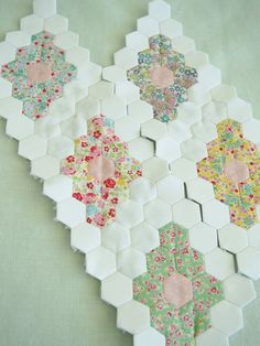 four hexagons with different patterns on them