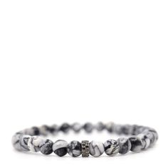 This unique bracelet features rare Pinolith from Sweden, its soft grey and white marbled pattern unlike any other stone. At the center, a sterling silver double row black diamond rondelle adds a bold contrast. Known for promoting peace and clarity, Pinolith makes this bracelet as powerful as it is beautiful.  Gemstones in their natural form are imperfect as such, no two stones are alike which add to the character and the beauty of the stone.  One-of-a-kind. Made in Canada. We passionately believe in sourcing and using the best quality gemstones for our collections. In our opinion, a little bit of wear and tear is a sign that your jewellery is loved and has been enjoyed! However, we appreciate that you will want to protect your special piece and keep it looking good for as long as possible. Canadian Jewelry, Beautiful Gemstones, September Birthstone Jewelry, Natural Form, Forever Jewelry, Unique Bracelets, Black Diamonds, Men's Jewelry Rings, Jewelry Ring Box