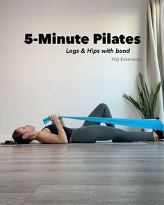 a woman is laying on the floor with a resistance band in front of her and text that reads 5 - minute pilates legs & hips with band