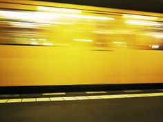 a train speeding by in the night time