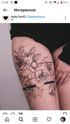 a woman's thigh with flowers on it