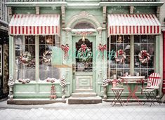 an old fashioned store front decorated with candy canes