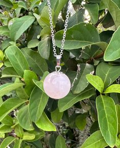 Rose Quartz Crystal Ball Pendant Genuine Rose Quartz Ball Necklace Healing Crystal Rose Quartz is the stone of universal love. It restores trust and harmony in relationships, encouraging unconditional love. Rose Quartz purifies and opens the heart at all levels to promote love, self-love, friendship, deep inner healing and feelings of peace. Calming and reassuring, it helps to comfort in times of grief. Rose Quartz dispels negativity and protects against environmental pollution, replacing it wit Pink Healing Necklaces For Valentine's Day, Pink Jewelry For Meditation, Adjustable Rose Quartz Crystal Necklace For Healing, Rose Quartz Jewelry For Meditation, Round Rose Quartz Jewelry For Meditation, Spiritual Rose Quartz Necklace For Valentine's Day, Valentine's Day Healing Rose Quartz Necklace, Rose Quartz Round Pendant Crystal Necklace For Gift, Rose Quartz Healing Necklace