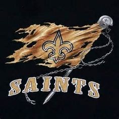 the new orleans saints logo is shown on a black t - shirt with flames coming out of it