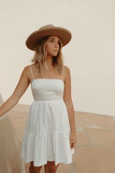 Our Seraphina Dress features an airy cotton fabric perfect for spring + summer. With embroidered eyelet detail throughout, dainty spaghetti straps and a tie back for a customizable fit. Pair it with some gold accessories and strappy sandals or wedges for an easy day or night look! Care + Measurements: 100% cotton Fully lined Hand wash cold S: approx 34.5" L (measured from shoulder to hem of skirt) Garden Party Sundress With Adjustable Straps And Straight Neckline, Summer Dress With Delicate Straps, Breezy Sundress With Spaghetti Straps And Adjustable Straps, Breezy Sundress With Adjustable Straps For Brunch, White Sundress With Delicate Straps For Summer, Spring Daytime Dresses With Adjustable Straps, Summer Sundress With Delicate Straps, Chic Sundress With Spaghetti Straps For Daytime, Breezy Dress With Adjustable Straps For Day Out