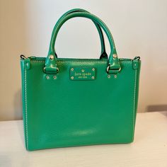 Brand New, Never Used. Has Removable/Adjustable Strap To Wear Over Shoulder As Well Kate Spade Green Leather Shoulder Bag, Kate Spade Green Satchel Bag, Green Kate Spade Shoulder Bag With Removable Pouch, Kate Spade Green Bag With Adjustable Strap, Green Kate Spade Shoulder Bag For Travel, Green Kate Spade Bag With Adjustable Strap, Kate Spade Green Crossbody Shoulder Bag, Kate Spade Green Shoulder Bag For Errands, Kate Spade Green Bag For Daily Use