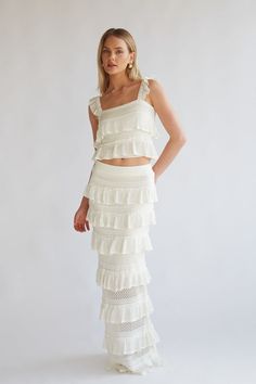 off white crochet knit tiered ruffle sleeveless crop top and maxi skirt set | unique coachella outfits Matching Long Skirt And Top Set, Dresses For Tropical Vacation, Senior Spring Break Outfits, Long Skirt And Top Set, Vacation Sets, Crochet Baby Skirt, Skirt And Top Sets, Dresses Fits, White Skirt Set