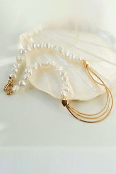 Metal: 18ct Recycled Gold Plated on Brass
Gemstone: Freshwater baroque pearl
Length: 450mm
Weight: 29.5g Luxury Pearl Chain Gold Bracelet, Luxury Pearl Bracelet With Pearl Chain, Luxury Gold Plated Pearl Chain Jewelry, Luxury 22k Gold Jewelry With Pearl Chain, Snake Chain Necklace, Recycled Gold, Baroque Pearls, Snake Chain, New Fashion