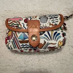 Dooney And Bourke Vintage Flap Wristlet White, Pink And Blue Nwot Good Condition Casual Travel Wristlet With Removable Pouch, Casual Wristlet With Removable Pouch For Travel, Casual Travel Pouch Wristlet, Casual Travel Wristlet Pouch, Casual White Wristlet For Everyday Use, Casual Multicolor Wristlet For Travel, Dooney And Bourke, Dooney & Bourke Bags, Dooney & Bourke