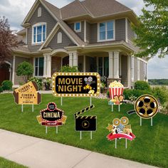 movie night yard signs in front of a house