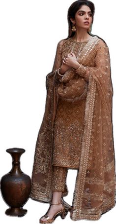 Pakistani Wedding Dress in Kameez Trouser Dupatta Style Elegant Dabka Lehenga For Traditional Ceremonies, Elegant Jamawar Salwar Kameez For Wedding, Elegant Unstitched Nida Suit For Wedding, Elegant Chinon Salwar Kameez For Traditional Ceremonies, Wedding Kurta With Intricate Embroidery In Nida, Elegant Churidar With Zari Work For Traditional Ceremonies, Wedding Churidar With Dupatta In Jamawar, Wedding Churidar With Sheer Dupatta In Jamawar, Traditional Floor-length Churidar With Intricate Embroidery