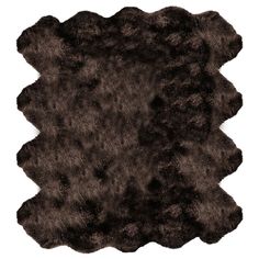 an animal fur rug is shown on a white background