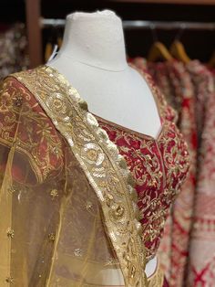 Ruby red gold floral embroidered border lace skirt paired with fully intricate zardozi, stone and thread work blouse and contrasting gold net dupatta. Fabric: Raw Silk This outfit can be customized in multiple colors and specific to client measurements. 90 days of production time is required and are for bulk orders only! Orders are processed in store only! Final fittings/alterations not included. Minimum Order Quantity- 4 pieces Brocade Embroidered Dupatta Fabric For Reception, Brocade Dupatta For Reception In Traditional Drape, Anarkali Traditional Wear With Gold Embroidery In Organza, Gold Embroidered Anarkali Set For Wedding Festivals, Anarkali Sharara With Gold Embroidery, Festive Anarkali Set With Gold Embroidery For Wedding, Anarkali Set With Gold Embroidery For Wedding And Festivals, Kundan Traditional Wear With Gold Embroidery, Festive Semi-stitched Lehenga With Gold Embroidery