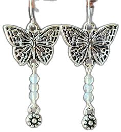 Bohemian Butterfly Earrings For Pierced Ears, Silver Butterfly Charm Drop Earrings, Bohemian Silver Butterfly Earrings, Elegant Adjustable Earrings With Butterfly Charm, Adjustable Drop Earrings With Butterfly Charm, Handmade Butterfly Metal Earrings, Handmade Metal Butterfly Earrings, Bohemian Butterfly Jewelry With Pierced Design, Butterfly Earrings For Jewelry Making