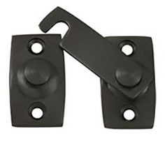 two black door handles with holes on each side