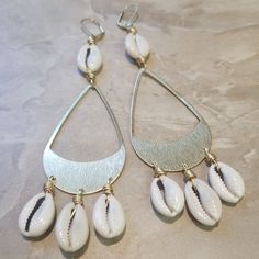 Gold Teardrop Earrings For The Beach, Gold Dangle Teardrop Earrings For Beach, Beach Drop Earrings In Metal, White Brass Earrings For The Beach, White Brass Earrings For Beach, Metal Drop Earrings For Beach, Beach Metal Drop Earrings, Nickel-free Brass Earrings For Summer, Bohemian Gold Chandelier Earrings For Beach