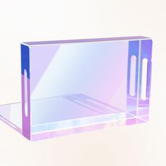 a glass shelf with two mirrors on it