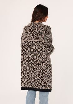 A soft bohemian sweater coat with a warm hood and side pockets. Designed in a taupe brown and black jacquard knit. Jacquard Relaxed fit Long sleeves Mid-length Hoodie Open front Side pockets Contrast ribbed trim Fall bohemian cardigan An instant classic, our warm and cozy sweater coat features a versatile mid-length hemline, an easy open front, and essential side pockets. The ultra-boho jacquard design pairs effortlessly with denim. Model is 5'9, wearing a size S. Style: I-51047K-SNE Beige Jacquard Knit Long Sleeve Outerwear, Black Jacquard Knit Outerwear For Fall, Cozy Jacquard Knit Sweater Coat, Cozy Jacquard Knit Long Sleeve Sweater Coat, Cozy Long Sleeve Jacquard Knit Sweater Coat, Cozy Jacquard Knit Winter Outerwear, Cozy Jacquard Knit Outerwear For Cold Weather, Cozy Winter Jacquard Knit Sweater Coat, Cozy Jacquard Knit Sweater Coat For Winter