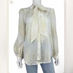 New With Tags, Long-Sleeve White And Gold Metallic Abstract Print Button-Down Blouse Featuring A Tie Neck. Brand = 7 For All Mankind Size = M Condition = New Level = Base Box #95 Burnt Orange Top, Faux Leather Vest, Color Block Shirts, Crochet Ruffle, Faux Leather Top, Women White Blouse, Tie Neck Tops, Red Flannel, Tie Neck Blouse