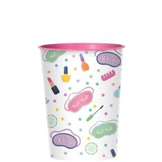 a paper cup with different items on it