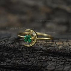 Zambia Emerald Gemstone Diamond Ring / Crescent Moon Dainty Cuff Ring / 14k Solid Gold Minimalist Emerald Ring / Stacking Ring / Handmade Jewelry / Wedding Ring / Birthstone of May.≫ Features• Item Code : SGR01306• Diamond: 100% Genuine Diamond• Diamond Wt: 0.015 ct• Diamond Color: G-H• Diamond Clarity: S2-SI1• Diamonds Cut: Brilliant Cut (Excellent Cut)• Emerald Gemstone wt  : 0.15 ct• Metal: 14K Solid Gold (18K also available - Additional fees may apply)• More option in gold color: Rose gold, Gold Emerald Stackable Wedding Rings, Gold Emerald Stackable Rings For Wedding, Elegant Crescent Gemstone Ring, Fine Jewelry Crescent Shaped Promise Ring, Minimalist Emerald Ring For May Wedding, Minimalist Emerald Ring With Round Band For Weddings, Fine Jewelry Crescent Promise Ring, Gold Jewelry For May Birthstone With Half Eternity, Celestial Style Stackable Open Rings For Wedding