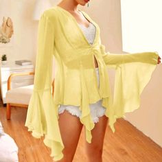 I Love Love Love This Flowy Airy Chiffon Top!! It Is A Soft Yellow Color...Perfect For The Spring Or Summer, Or Anyone Who Loves Those Retro Vintage Vibes. This Top Looks Amazing Paired With Bell Bottoms, Skinnies, Or Shorts!! Size Xs, And Is True To Size.