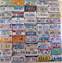 many license plates are stacked on top of each other