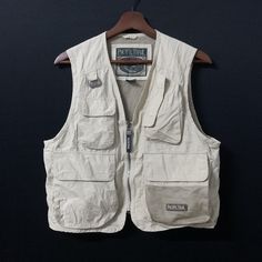 "PLEASE READ FULL DESCRIPTION BEFORE PURCHASING Vintage Pacific Trail Brand Multi Pocket Hunting Fishing Utility Tactical Sleeveless Vest Size On tag: S (Kindly please check measurement below) Material: Cotton Condition: 9/10 ( GREAT No hole. Got some Yellow Wish kindly please refer photo ) MEASUREMENT: All measurement are taken when laid flat on the ground in inches Chest (armpit to armpit): 19\" RECOMMENDED size S international Length (from top to bottom): 20\" PAYMENT & SHIPPING: Accept PAYPA Vest Street Style, Pacific Trail, Hunting Vest, Fishing Vest, Utility Vest, Tactical Vest, Vest Designs, Men's Outerwear, Mens Fashion Casual Outfits