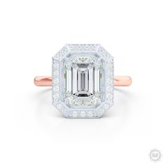 an emerald cut diamond ring set in 18k rose gold