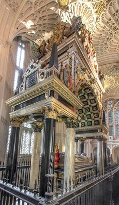 an ornately decorated church with columns and arches