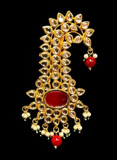 Ruby Kalgi jewelry for Groom's Pagdi Kalgi Designs Gold, Red Tikka With Stone Work As Gift, Red Stone Work Tikka As Gift, Red Temple Jewelry For Marriage, Hand Set Red Jewelry For Marriage, Festive Ceremonial Gold Beads Jewelry, Heavy Red Jewelry For Marriage, Indian Groom Jewellery, Red Kundan Jewelry For Marriage