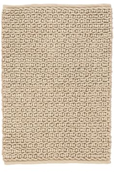 a beige rug on a white background