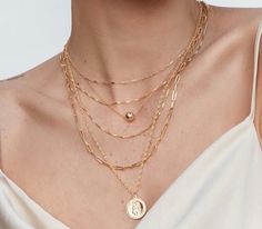 14k gold filled. Made to live in, made to last. Adjustable from 14.5 inches to 16.5 inches. Dainty chain with an 8mm round gold charm. Dainty Chain, Gold Charm, Gold Filled, Chain, Gold