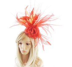 Hats By Cressida Kentucky Derby & Ascot Fascinator Hats Spring Summer Hat & Fascinator Collection A mass of of red & peach feathers surround a red rose Main body about 6-7 inches wide, bigger with the long wispy feathers Mounted with a matching headband. If you prefer a headband to match your hair, please make a note at check out what colour headband you want. We make each hat to order and can add or change colours just email us with what you need.  We can also make a custom design for you if yo Red Feathered Fascinator For Kentucky Derby, Red Feathered Fascinator, Red Feathered Costume Hat For Races, Red Feathered Hat For Races, Fitted Red Feathered Fascinator, Fitted Red Fascinator With Feathers, Adjustable Red Feathered Fascinator, Red Adjustable Fascinator With Feathers, Adjustable Red Fascinator With Feathers