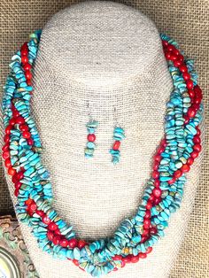 This Southwestern necklace and earrings for women is made up of red Coral and Genuine Natural Turquoise chip beads.  It is a stunning and classic  6 strand jewelry set.  The color combination is striking. This beautiful classic necklace is perfect for that natural, casual, boho look. It will make a great gift for a friend who loves beaded jewelry. It is handmade ending up in a silver toggle to create this feminine necklace. This necklace is 20" long and comes with matching earrings. This is a ge Southwestern Style Beaded Dangle Jewelry, Southwestern Style Dangle Jewelry With Colorful Beads, Southwestern Style Colorful Beads Dangle Jewelry, Southwestern Style Colorful Beaded Dangle Jewelry, Southwestern Style Round Gemstone Beads Jewelry, Southwestern Red Jewelry With Natural Stones, Southwestern Gemstone Beads Jewelry Gift, Artisan Red Jewelry With Gemstone Beads, Southwestern Style Round Beads For Jewelry Making