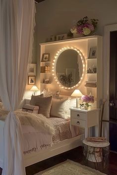 a white bed sitting under a round mirror in a bedroom