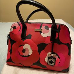 This Pretty Leather Kate Spade Handbag Will Be A Great Addition To Your Closet! Bright Pretty Pinks/Reds Make It Very Graphic: Imagine It With Your Favorite Lbd! There Are No Feet On The Bottom Of The Bag But The Interior Is Spotless (Virtually Unused). Extra Cute Hanging Tag Makes The Purse Really Special! Pink Floral Print Leather Bag, Chic Formal Bags With Floral Print, Chic Formal Bag With Floral Print, Elegant Red Bags With Floral Print, Elegant Red Floral Print Bags, Chic Kate Spade Bags With Floral Print, Elegant Kate Spade Bags With Floral Print, Red Floral Print Shoulder Bag, Elegant Kate Spade Floral Print Bags