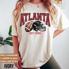 Comfort Colors Atlanta Football Shirt * Atlanta Football Sweatshirt * Vintage Style Atlanta Football shirt * Atlanta sweater * MC189 We create custom sweatshirts with great designs for everyone's liking. If you don't find the size or color you would like, please message us and we will be happy to accommodate! PRODUCT We use the finest premium Comfort Colors® 1566 crew-neck Garment-Dyed Sweatshirt & Comfort Colors® 1717 Garment-Dyed T-shirt, they are feather soft and very breathable with a good s Collegiate Crew Neck T-shirt With Custom Print, Custom Print Long Sleeve College T-shirt, Collegiate Custom Print Crew Neck T-shirt, Sporty Custom Print Tops For Fall, Collegiate Crew Neck Top With Custom Print, Custom Print Crew Neck Fan Gear Top, Custom Print Crew Neck Top For Fan Gear, College Crew Neck Shirt With Custom Print, Crew Neck Top With Custom Print For Fan Apparel