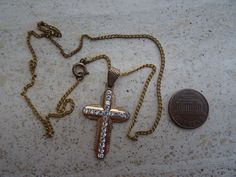 Religious antique French vermeil gold plated chain necklace with vermeil gold plated Christian cross crucifix with transparant stones. I bought the chain with cross on a brocante ( fleamarket ) ( Lille ) in France. Measures Chain: 16,8 inches ( 42 cm ) Measures cross crucifix ; 0,87 x 1,4 inches ( 2,24 x 3,57 cm ) If you don't have paypal you can pay by bank transfer. Registered shipping is possible. For other pictures or information do not hesitate to contact me. I deliver all over the world. Antique Gold Cross Pendant Necklace, Gold Crucifix Cross Necklace For Formal Occasions, Antique Gold Crucifix Necklace, Vintage Gold Cross Pendant Necklace, Vintage Yellow Gold Cross Necklace, Vintage Yellow Gold Cross Necklaces, Vintage Gold Cross Charms And Jewelry, Chain With Cross, Christian Cross