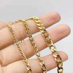 The Classic Cuban Chain in gold is an iconic accessory, boasting timeless elegance and strength in its design. Crafted meticulously, it showcases interlocking links that exude luxury and sophistication. This chain is a symbol of refined style, effortlessly elevating any attire, and remains a staple piece that transcends trends, embodying everlasting class and allure. Thickness: 3/4/5mm Metal: 14K Gold plated Stainless steel Tarnish free / Water resistant 💧 Refined Style, Chain Gold, Cuban Chain, Staple Pieces, Chain Styles, Timeless Elegance, Gold Plate, Water Resistant, Chain