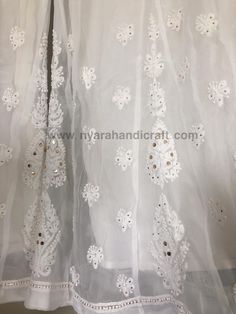 "Fine Georgette Chikankari Palazzo with Mukaish add ons accompanied with pure chiffon dupatta with Mukaish and hand crochet Lace ! Team it with Chikankari kurtis for a complete look. Drawstring waistband , one size fits most ( upto 44 inches waist) Length : 39inches \"Embroidery design may vary\"" Chikankari Embroidery Dupatta In Chinon For Festivals, Chikankari Embroidered Chinon Dupatta For Festivals, White Chikankari Embroidery Salwar Kameez For Celebration, Unstitched Chanderi Sharara With Lace Work, White Anarkali Set With Cutdana For Celebrations, Lace Work Anarkali Set For Festivals, Festive Anarkali Set With Lace Work For Festivals, White Chikankari Embroidery Dupatta For Celebration, Navratri Chikankari Embroidery Dupatta In Chinon