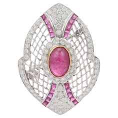 Statement Art Deco Diamond Ruby Brooch for Wedding in 18K White Gold which is a fusion of surrealism and pop-art, designed to make a bold statement. Crafted with love and attention to detail, this features 6.91 carats of ruby and 0.75 carats of diamond. Ruby improves mental strength. This brooch is truly a must have accessory to elevate your wardrobe with its timeless beauty and versatility which makes you stand out of the crowd. This is a perfect Unique Gift, Father Gift, Unisex Gift, Gift For Her, Gift For Him, Men Gift, Bride To Be Gift, Groom To Be Gift, Gifts For Men, Wedding Gift, Engagement Gift or Anniversary Gift or any Holiday Gift for Mother, Sister, Daughter, Grandma, Fiancé, Girlfriend, Valentine, Father, Boyfriend, Husband, Family or Friend on your list. It will add a spark t Ruby Brooch, Jewelry Ruby, Gemstone Brooch, Gold Baroque, Father Gift, Square Stone, Statement Art, Diamond Brooch, Ruby Stone