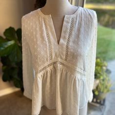 Loft Boho Tunic Sheer Blouse Long Sleeves Ecru White Eyelet Accents V Neck In Size Xs. New With Tags Originally At $59.50. Color May Vary In Pictures Due To Lighting. Approximate Measurements: Pit To Pit: 37 Inches (18.5 X 2) Shoulder To Hem: 23 Inches Sleeves: 21 Inches Box#2 Off White V-neck Top For Daywear, Off White V-neck Blouse For Day Out, Off White V-neck Top With Lace Trim, Spring Cream Top For Workwear, Cream Tops For Spring Workwear, Spring Workwear Cream Top, Cream Top For Workwear In Spring, Chic Off-white Tops With Lace Trim, Chic Off White Tops With Lace Trim