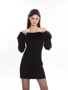 Embrace elegance with a twist in this off-shoulder faux fur trim mini dress, a chic addition to any wardrobe. Crafted with attention to detail, this dress features a sleek silhouette, long sleeves, and a playful faux fur trim that graces the shoulders, adding a touch of glamour. The fabric composition prioritizes comfort and style, ensuring a flattering fit for those evenings out or special events. Style this versatile piece with booties or heels for an evening look, or dress it down with a pair Faux Feather Knit Mini Dress, Luxury Black Off-shoulder Mini Dress, Social Gathering, Fur Trim, Mini Black Dress, Date Night, Faux Fur, Timeless Design, Off Shoulder