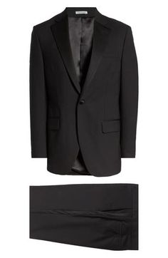 Fine wool and handsome satin trim define a clean, tailored tuxedo that's ready for elegant evenings and special occasions. Jacket has peaked lapels Partially lined 100% wool Dry clean Made in Canada Black Silk Suits With Lapel Collar, Black Tuxedo Suits With Structured Boning, Black Tuxedo With Structured Boning, Black Silk Blazer For Black-tie Events, Classic Flat Front Tuxedo For Formal Occasions, Classic Formal Tuxedo With Flat Front, Classic Tuxedo With Pressed Crease And Flat Front, Elegant Tailored Tuxedo With Flat Front, Silk Tuxedo Suit For Formal Occasions