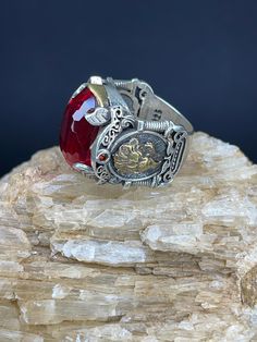 Red Zircon With Lion Figured Silver Men's Ring | Handmade | 20g | Free Shipping 🔹 Discover the allure of our handcrafted Zircon Stone ring, designed for those who appreciate elegance and sophistication. This remarkable men's ring, weighing a solid 20 grams, features a dazzling Zircon gemstone that captures and reflects light in a mesmerizing array of colors. 🔹 Key Features: *Material: Premium Silver *Gemstone: Zircon *Weight: 20 grams *Design: Handcrafted for unique beauty *Guarantee: 1 year ? Collectible Red Rings With Polished Finish, Collectible Red Engraved Ring, Collectible Red Ruby Ring With Polished Finish, Collectible Red Ruby Rings, Collectible Red Gemstone Rings, Unique Red Ruby Ring Collectible, Collectible Red Ruby Jewelry, Unique Red Ruby Ring For Collectors, Collectible Red Gemstone Signet Ring