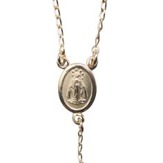 Made from 14k gold-filled for a luxurious look and feel Includes a Madonna and Child crucifix framed with a cross charm A Miraculous Medal rests in the center of the necklace Rosary beads surround the medal for an elegant aesthetic Necklace measures 16" and 20" round perfect for everyday wear This Gold Miraculous Medal Rosary Necklace will add beauty to your faith. This rosary necklace combines the symbolism of two culturally significant Catholic artifacts, a 14 Karat gold-filled crucifix and th Catholic Cross Necklace, Gold Rosary Necklace, Beautiful Rosary, Rosary Jewelry, Catholic Necklace, Gold Rosary, Catholic Jewelry, Elegant Aesthetic, Rosary Necklace