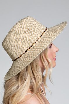 Introducing the Ruggine Panama Hat, a stunning accessory that effortlessly combines style and sophistication. Crafted with care, this hat features a gorgeous woven two-tone design that adds a touch of elegance to any outfit. Made from 100% paper, the Ruggine Panama Hat is not only lightweight but also breathable, making it perfect for those sunny days out. Its approximate circumference of 22.5 inches ensures a comfortable fit for most head sizes. The hat boasts a wide brim of 3.50 inches, provid