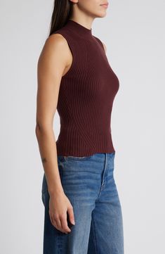 Wide ribbing adds distinguished texture to a mock-neck tank top that's ideal for layering or standalone wear. Mock neck 53% polyester, 19% acrylic, 19% polyamide, 6% wool, 3% metallic fibers Hand wash, dry flat Imported High Neck Ribbed Knit Top For Layering, Ribbed High Neck Knit Top For Layering, Solid Ribbed High Neck Tank Top, Solid High Neck Ribbed Tank Top, High Neck Ribbed Knit Tank Top, Ribbed Turtleneck Tank Top, Stretch Ribbed Turtleneck Tank Top, Ribbed Knit High Neck Tank Top, Fitted High Neck Ribbed Tank Top